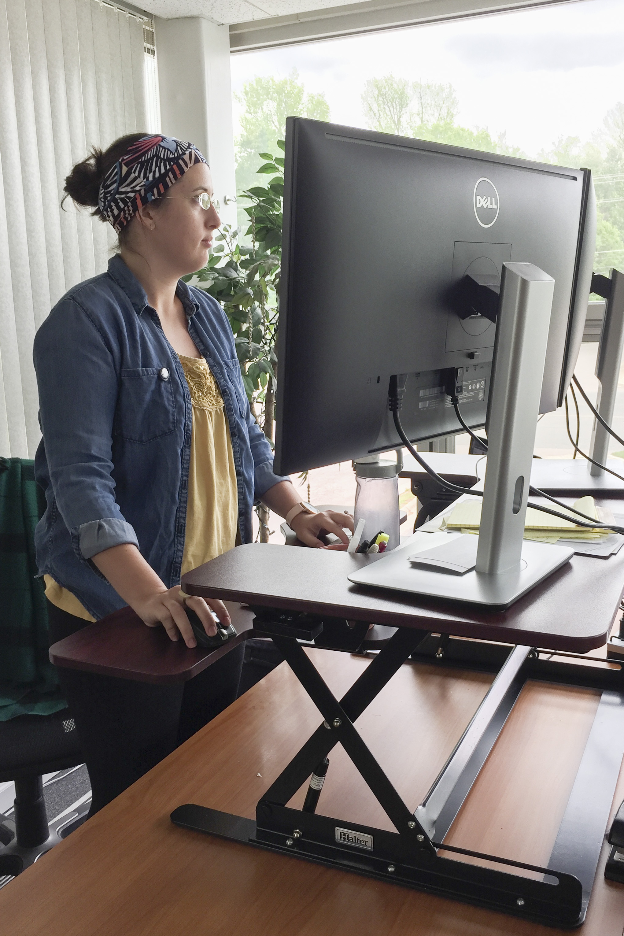 Standing at raised desk