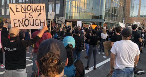 Demonstrators in front of Durham Police headquarters